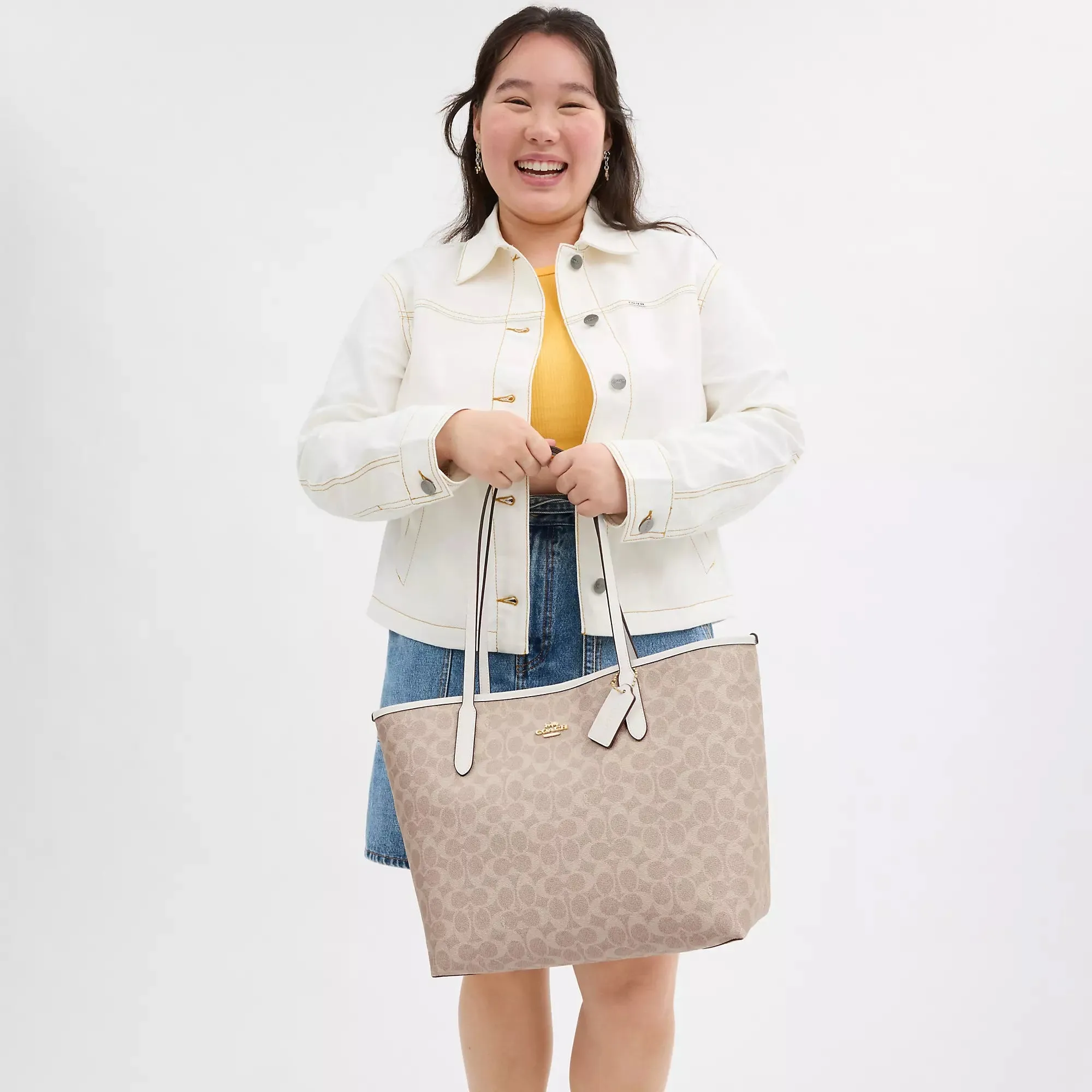 Coach Outlet City Tote Bag In Signature Canvas