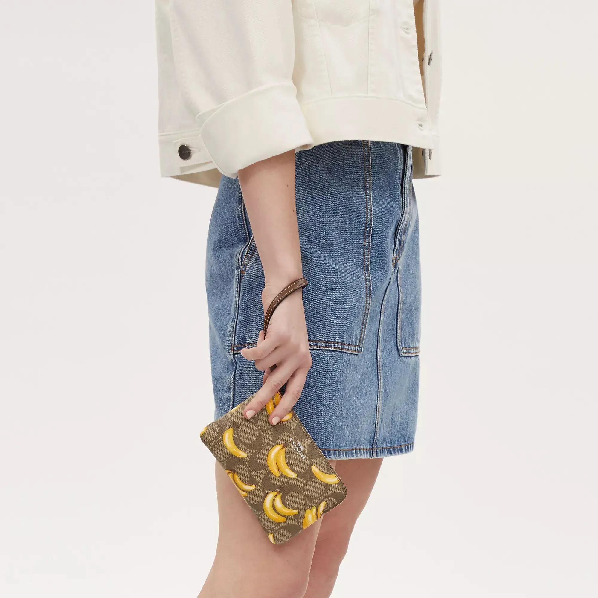 Coach Outlet Corner Zip Wristlet In Signature Canvas With Banana Print