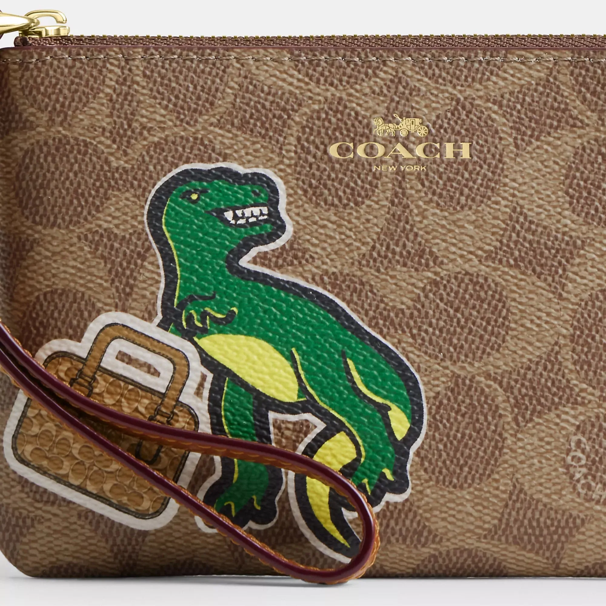 Coach Outlet Corner Zip Wristlet In Signature Canvas With Sticker Print
