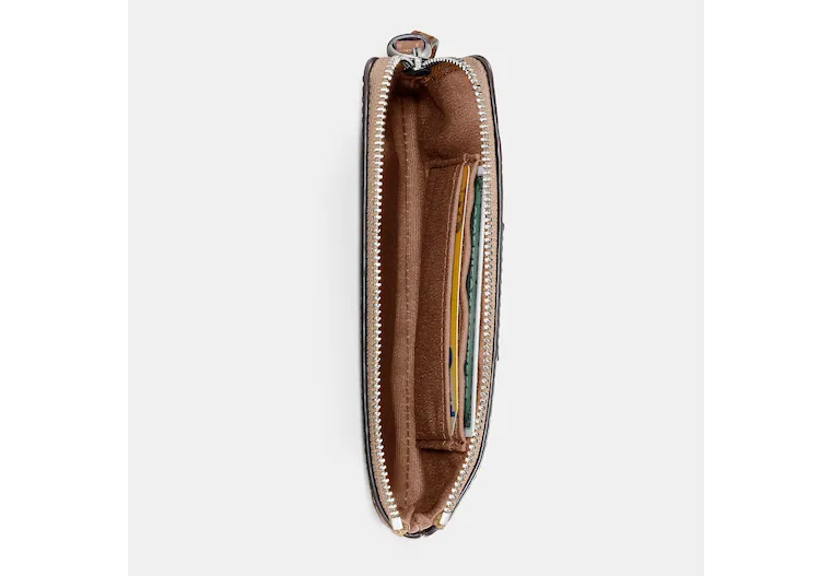 Coach Outlet Corner Zip Wristlet In Signature Canvas