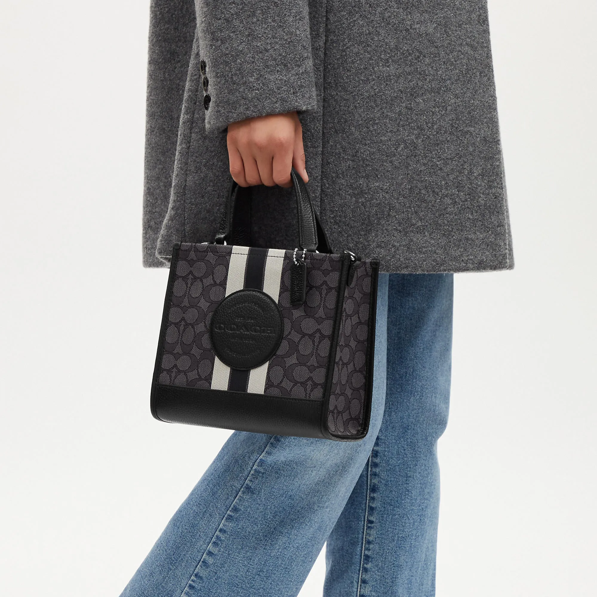 Coach Outlet Dempsey Tote 22 In Signature Jacquard With Stripe And Coach Patch