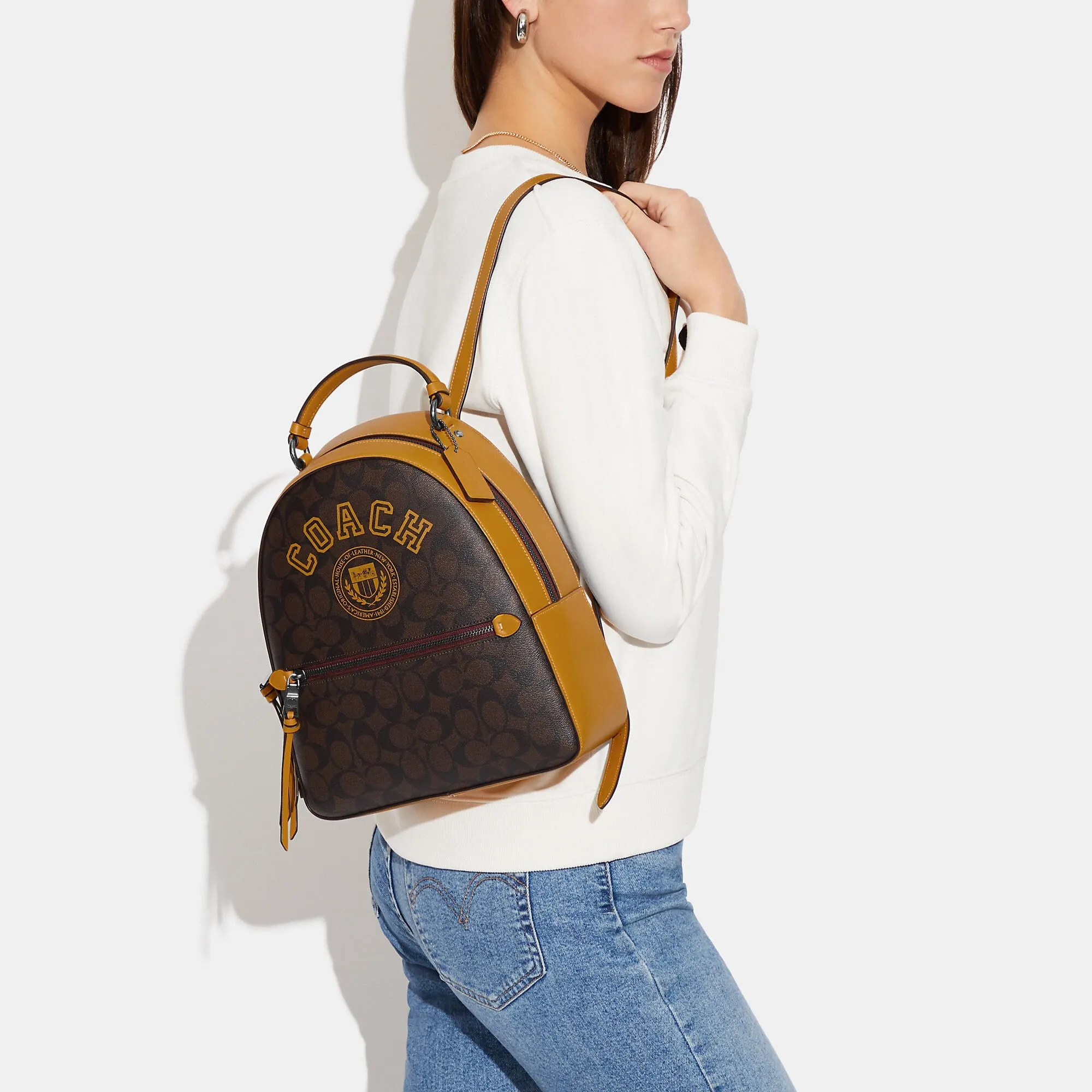 Coach Outlet Jordyn Backpack In Signature Canvas With Varsity Motif