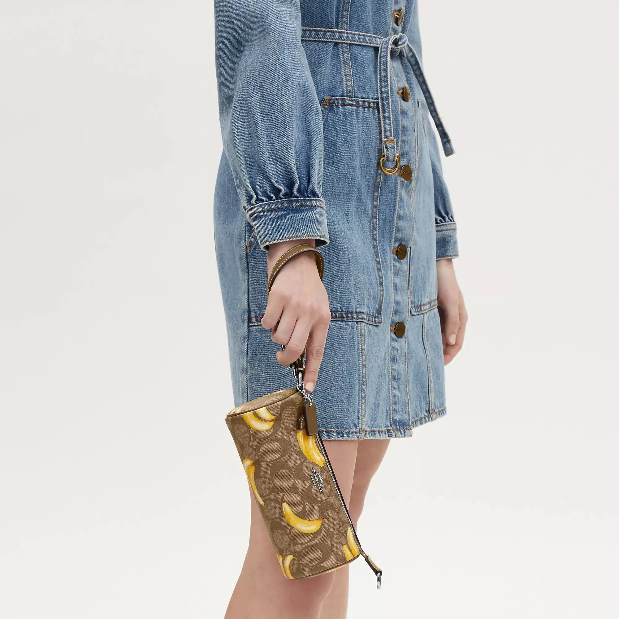 Coach Outlet Nolita Barrel Bag In Signature Canvas With Banana Print