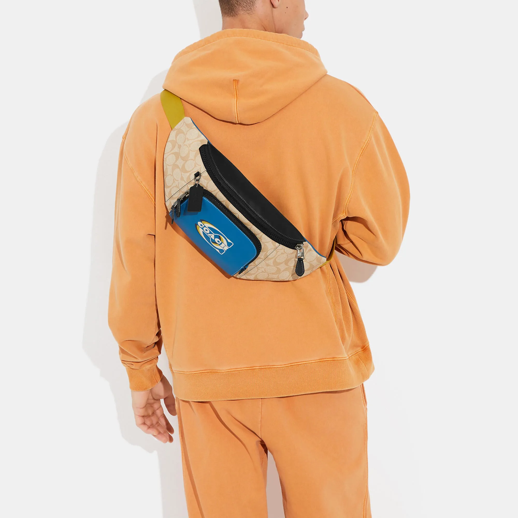 Coach Outlet Track Belt Bag In Colorblock Signature Canvas With Coach Stamp